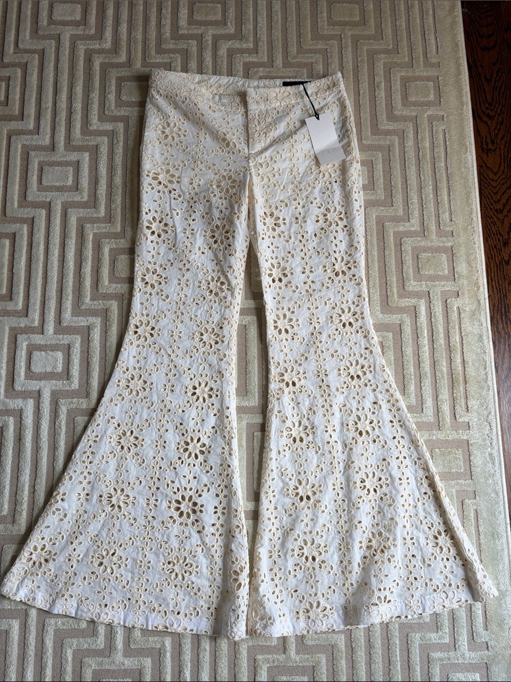 Ivory cotton, eyelet bell bottom pants
